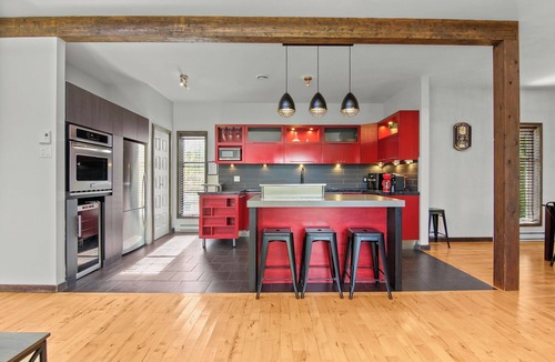 Saint-David-de-Falardeau Ski Chalet | Enjoy our cozy waterfront chalet with a private hot tub, stunning views,