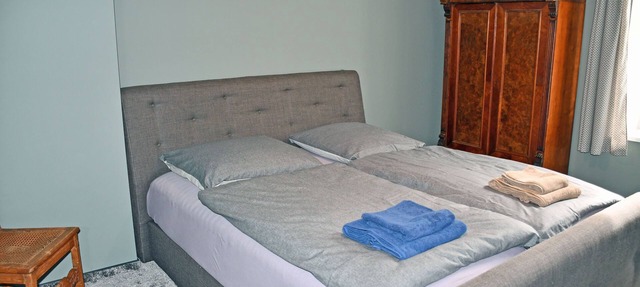 07 Muttland vacation apartment with fireplace - vacation apartments in the Gnies manor house in Ralswiek