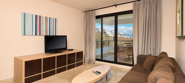 2 bedrooms apartment side sea view in Torrox Costa