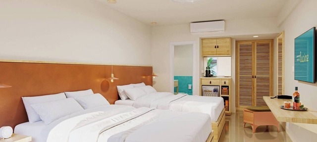 Beachside Balcony Room | Double Queens + Rooftop Drinks & Pool in Galveston