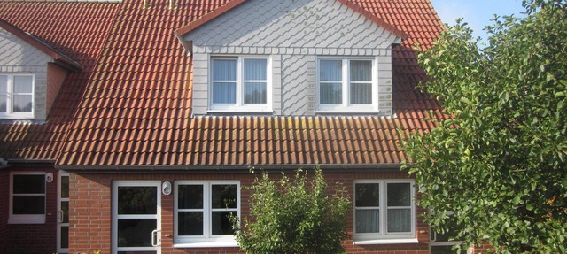 Comfortable holiday center house with its own garden directly at the nature reserve in Borkum