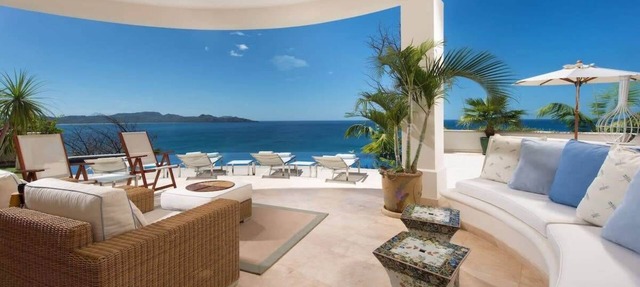Exquisite Hilltop Villa with Luxurious Modern Design, Sweeping Ocean Views & Sparkling Infinity Pool in Playa Flamingo