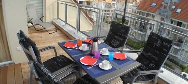 Fantastic penthouse apartment Ostseebrise 13 in Großenbrode. Exclusive feel-good atmosphere with sauna, bathtub & fireplace. Two balconies with loungers and practical washing machine. Incidental costs included in Großenbrode