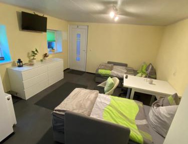Kleines Studio mit Gartenzugang in Milbitz