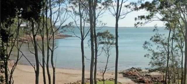 Lawns To The Beachfront in NORTH ARM COVE