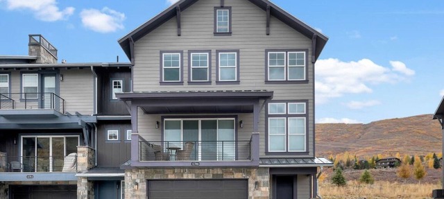 Unparalleled luxury condo nestled with views of both Jordanelle Reservoir & Deer Valley in Daniel