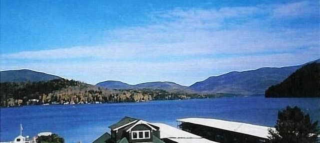 We sleep 10 (8 adults) Lakefront condo; staggering lake/mountain view; in town. in Lake Placid